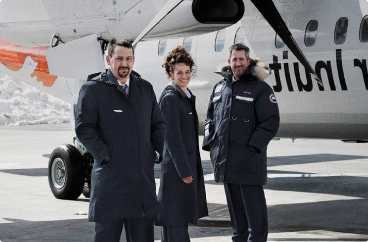 Photo d'équipe sur le tarmac