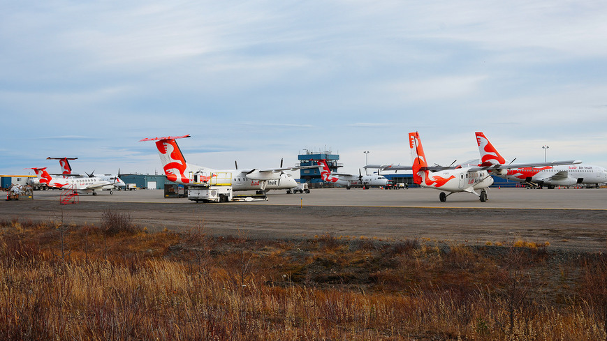 Photo d'équipe sur le tarmac